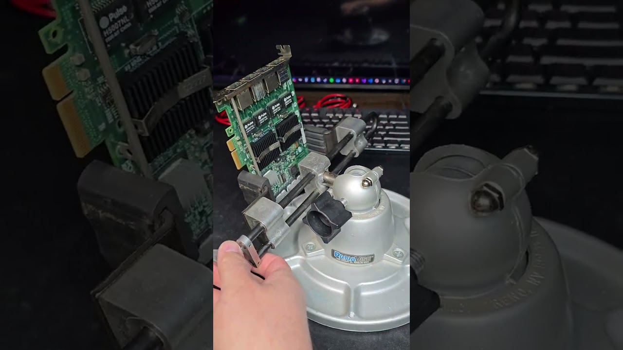 PANAVISE With Standard Rubber Jaws Holding A PCB