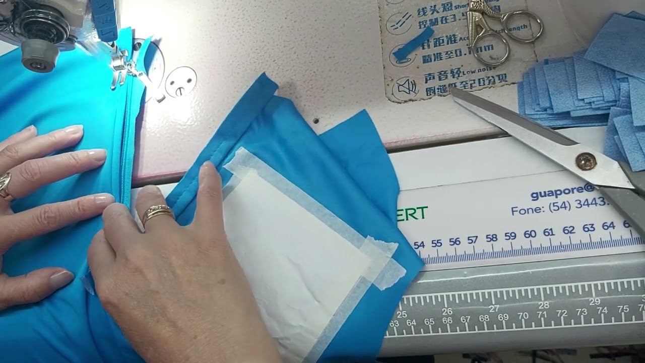 colocação de zíper em camisa polo frente e verso a pedidos dos inscritos