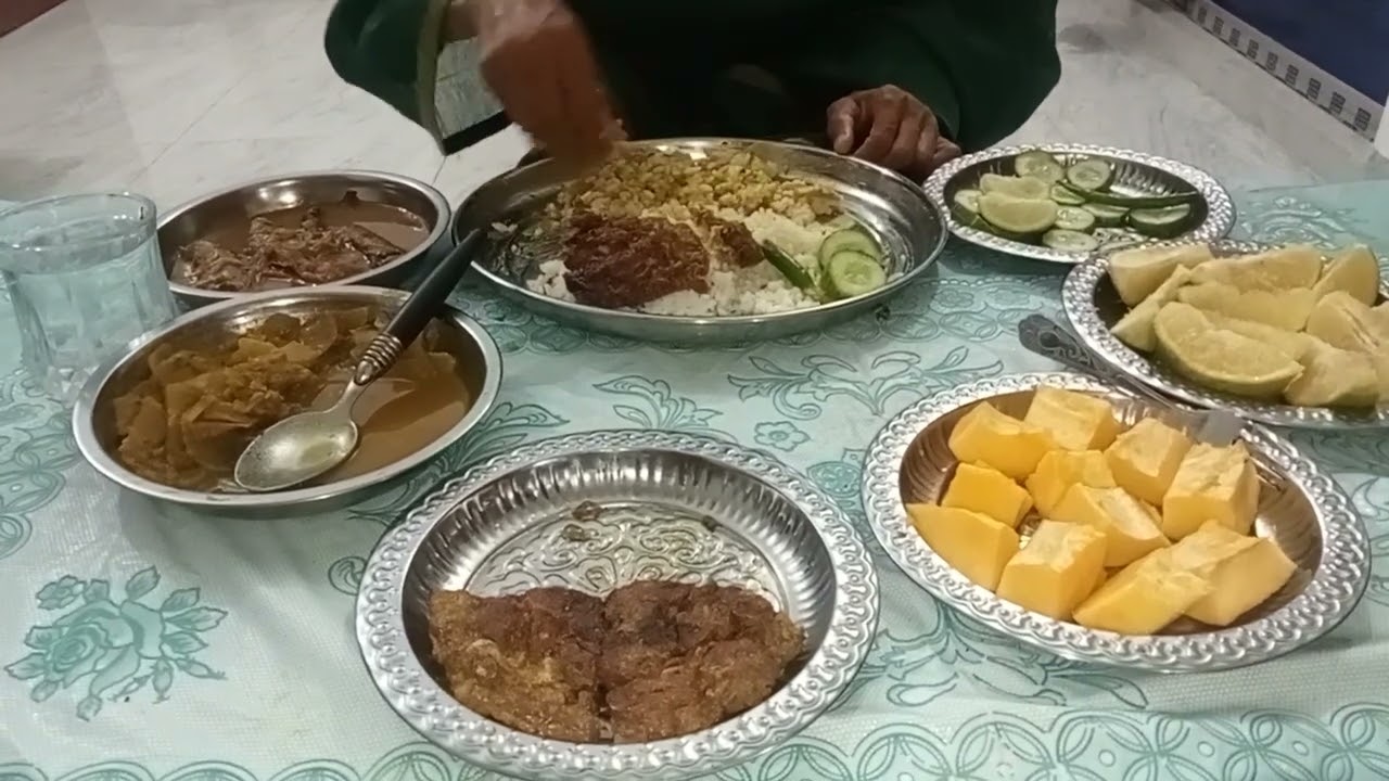 Eating Rice with Shing macher jhol, Mular torkari,Dim Vaja Fruit item: Pepe, Malta
