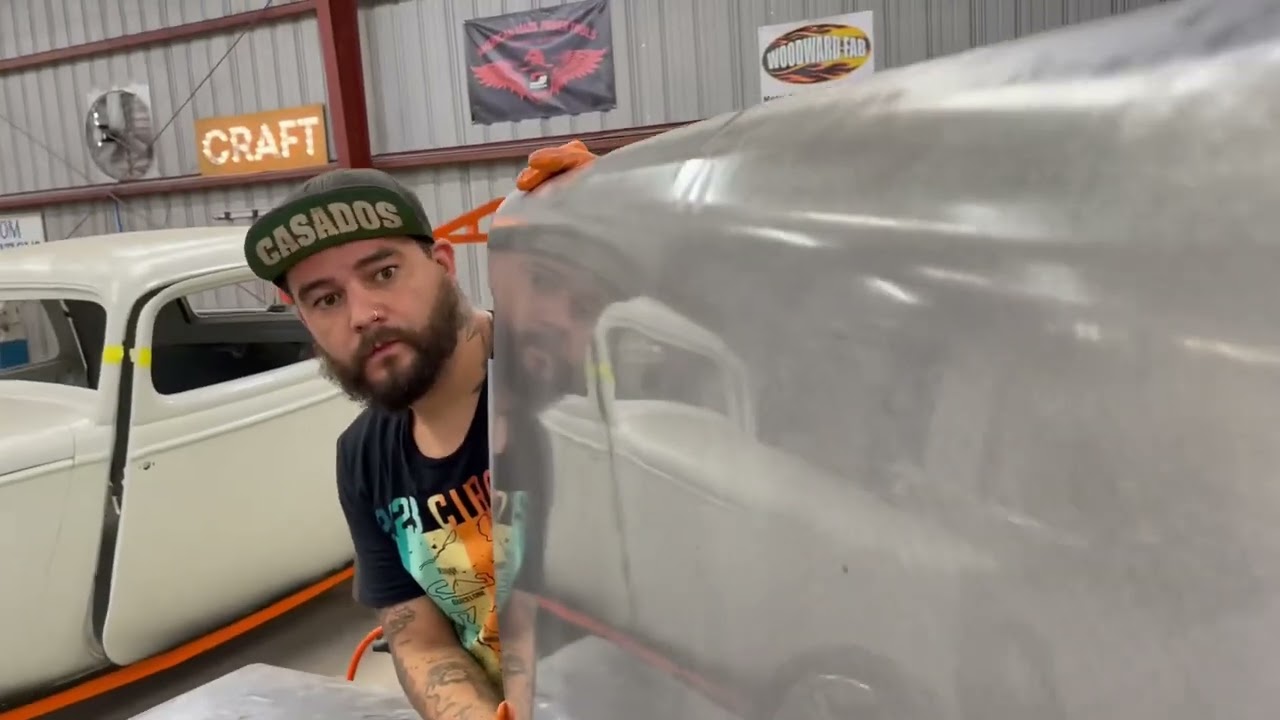 Wheeling out a new low crown door skin on the English wheel for the 1939 Chevy