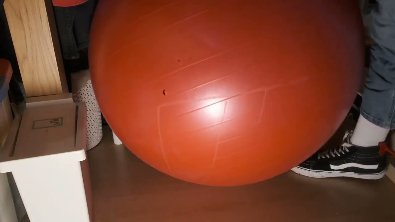 Popping a gym ball with sneaker spurs