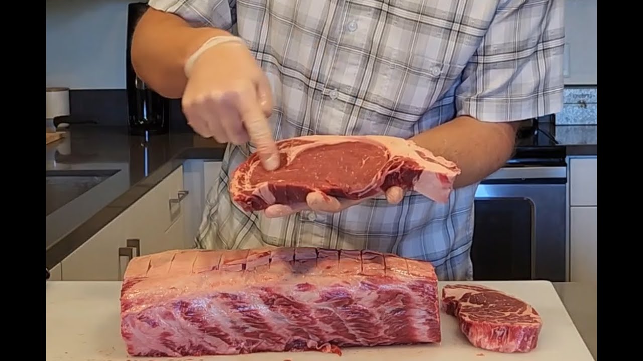 Save money on ribeye steaks by cutting down a whole rib roast!