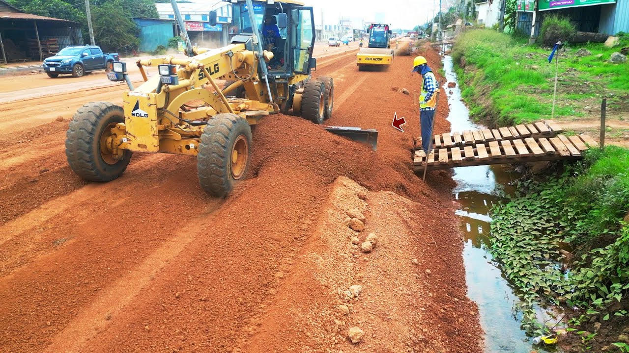 Watch This Smooth Skill in Action on a Beautiful Slope of Building Road Base In A Countryside