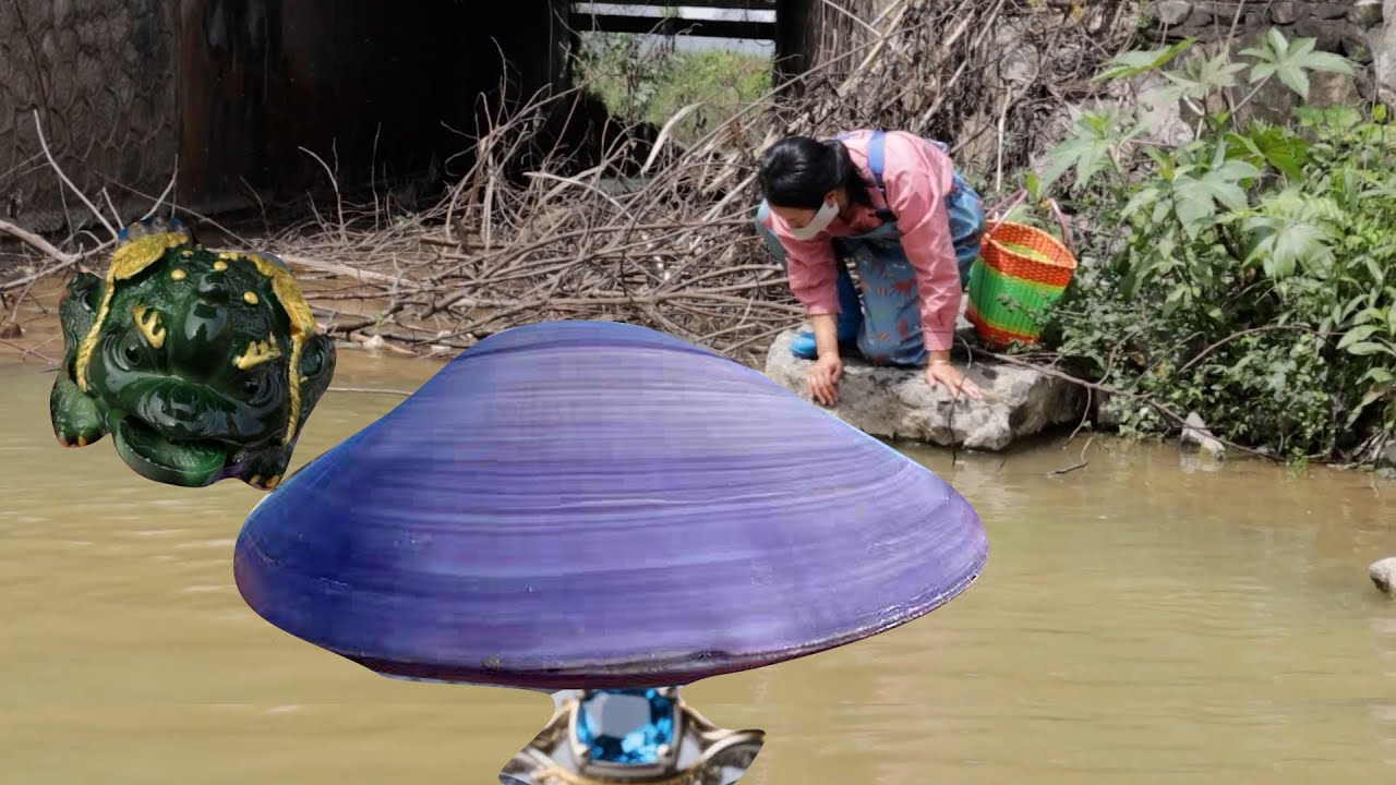 Seeing a big clam under the bridge hole, the girl walked into the water and picked it up.
