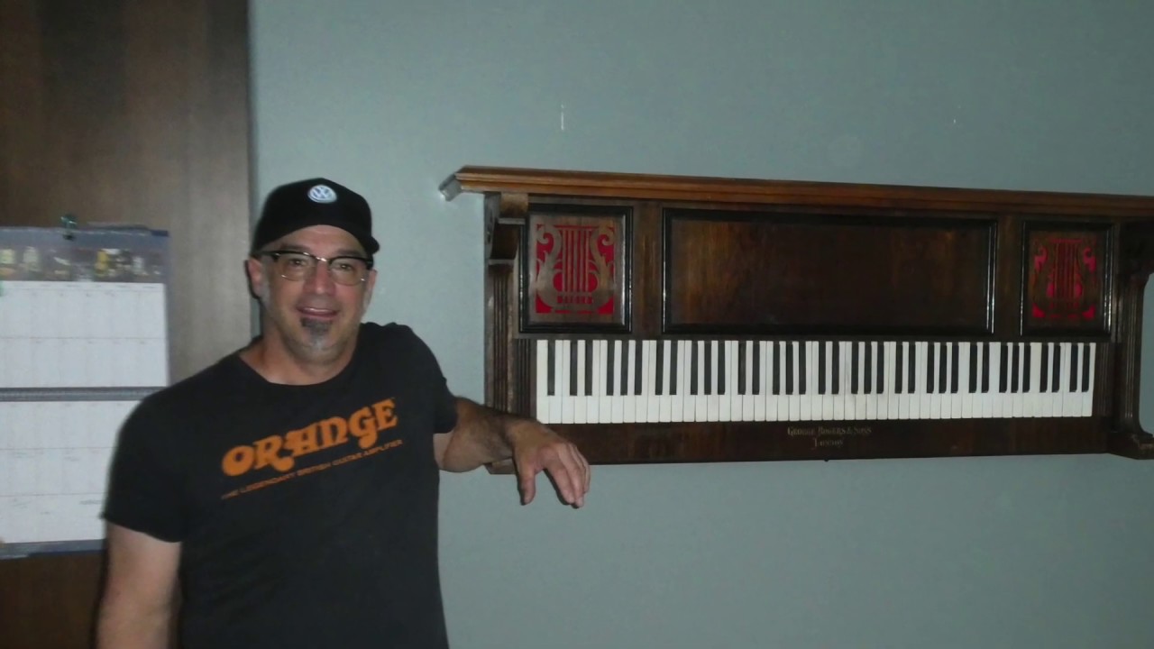 Piano Shelf- Repurposing an old piano into a shelf.