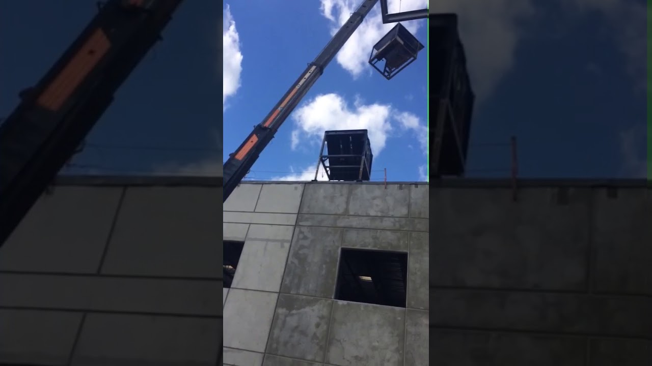 Hoisting Gravel is one of many Roofing Crane Services