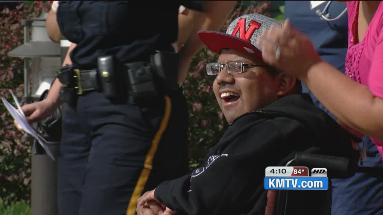 Omaha police surprise man hit by drunk driver as a child