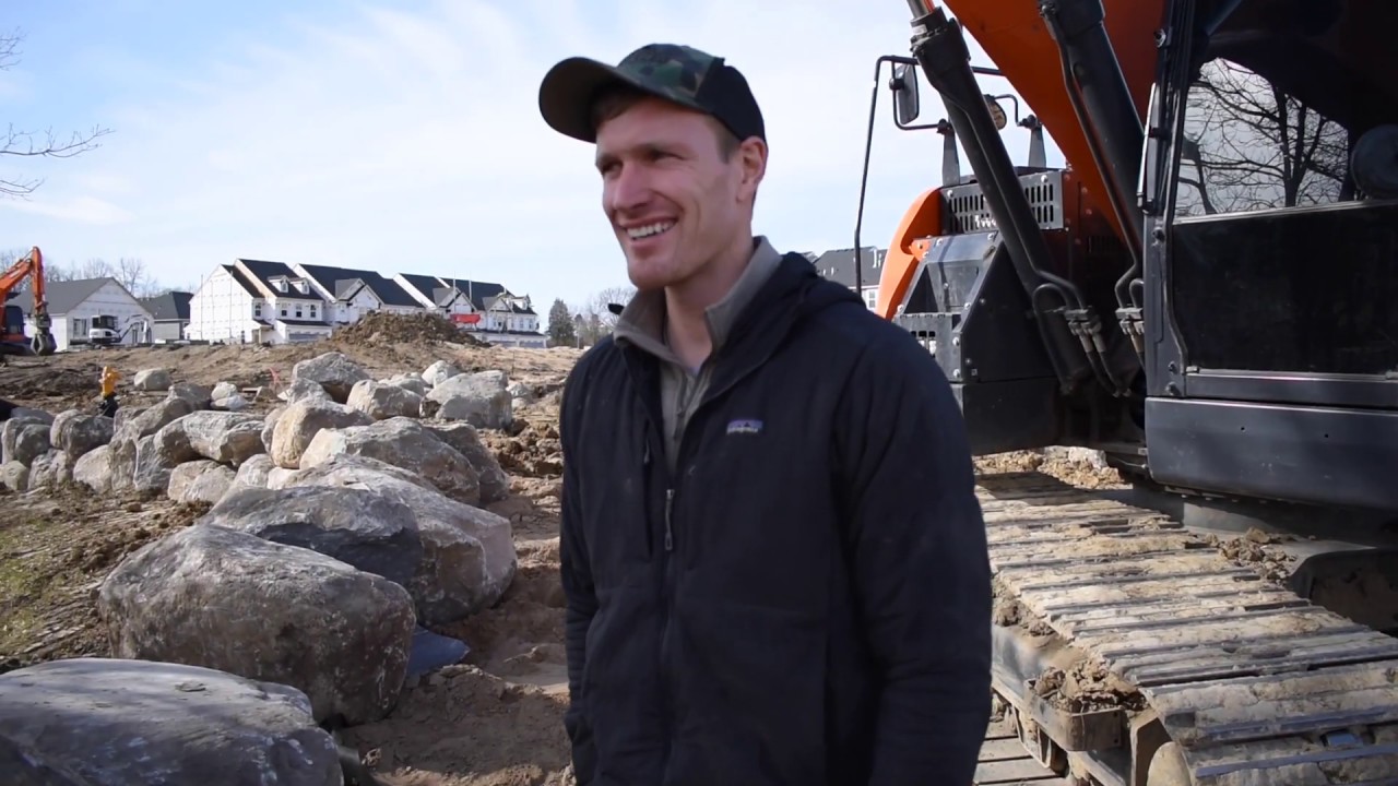 TIPS AND TRICKS ON BUILDING MASSIVE BOULDER WALLS