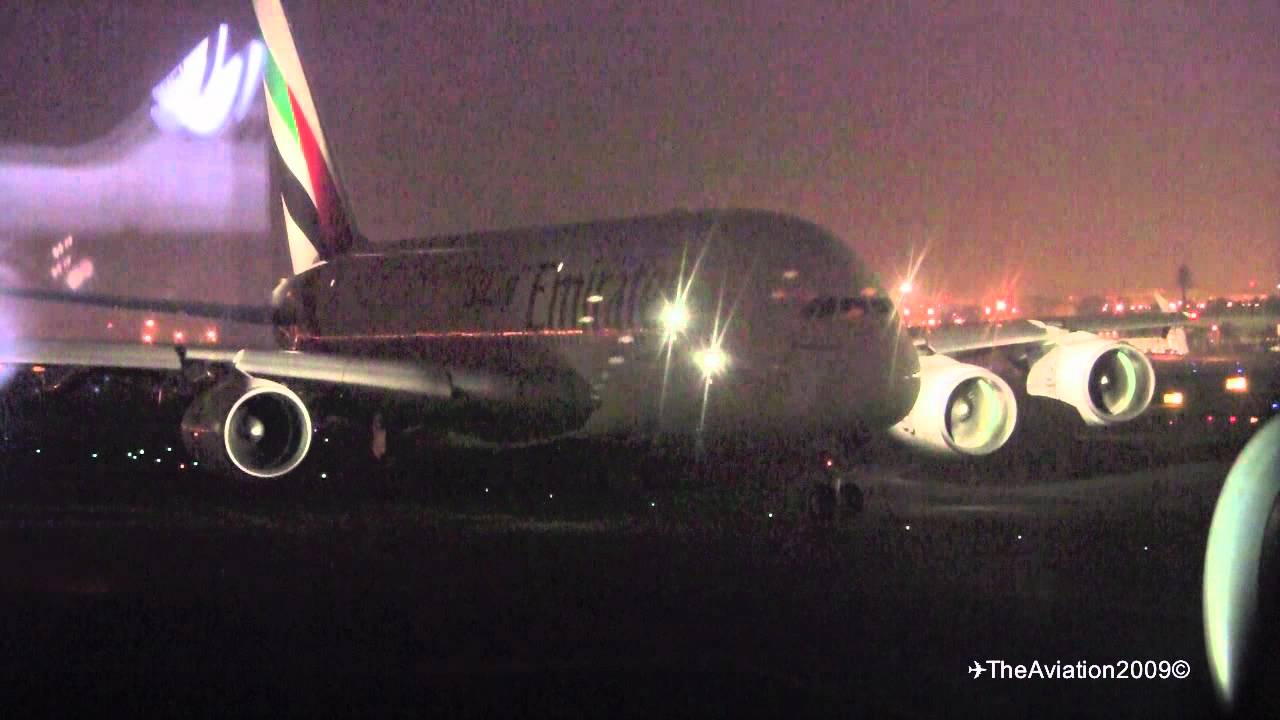 A380 - Amazing strobe - beacon light effects - Window view from a another EK A380