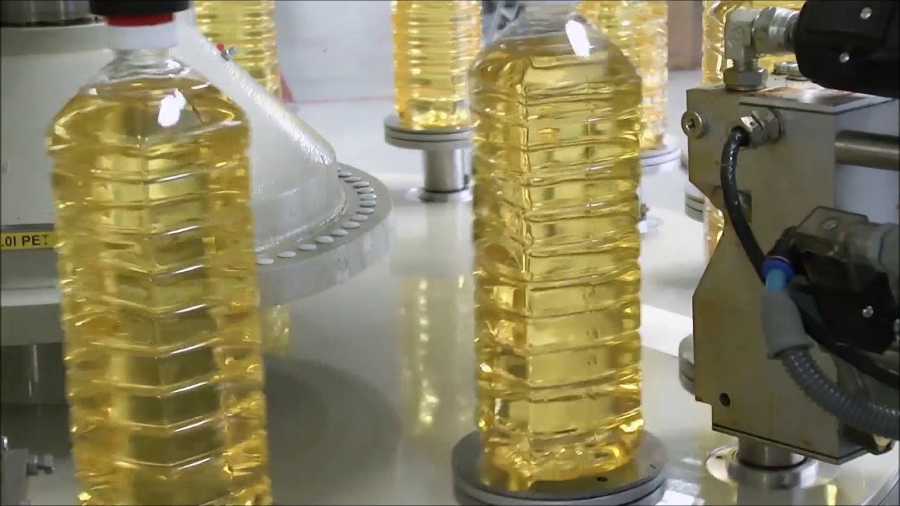 Gernep hot melt cut & stack labeler for edible oil