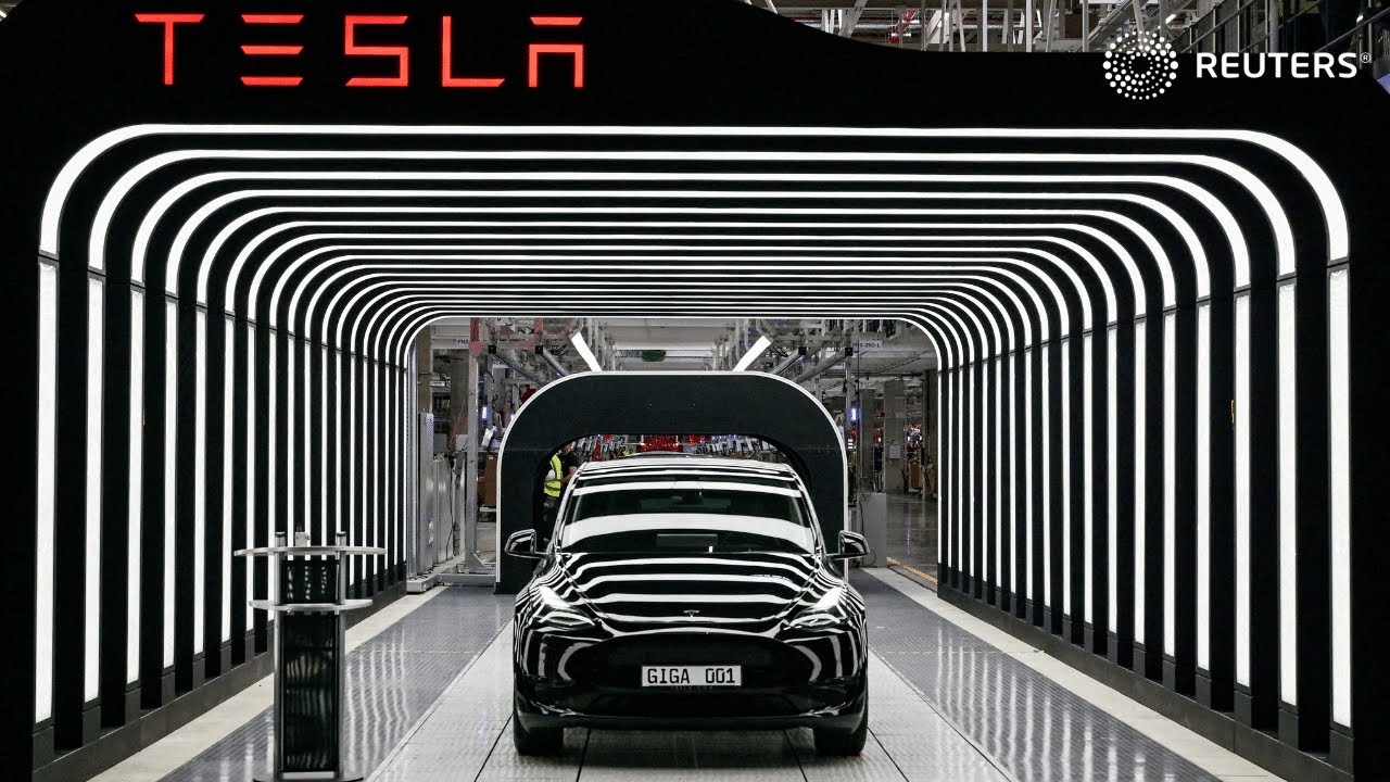 Wall Street ends lower as Tesla shares fall