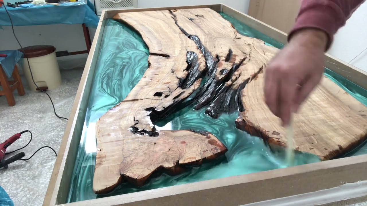 A 1000-Year-Old Olive Tree Turned Into a Green Epoxy Table