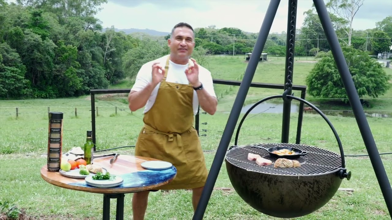 Peter Kuruvita cooking Seafood on a Wild Fire Pit in Palmwoods on the Sunshine Coast.