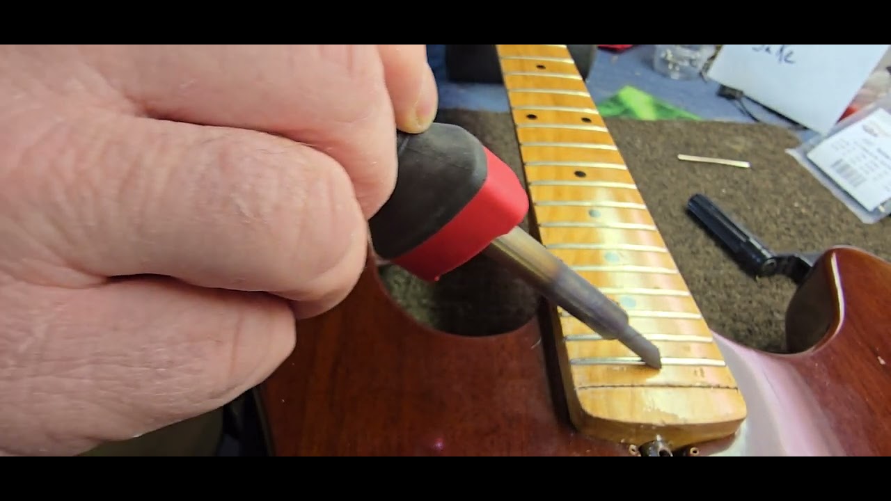 Guitar repair.  how to remove fret wire from your guitar.  my channel just hit 1k subs! Thank you !