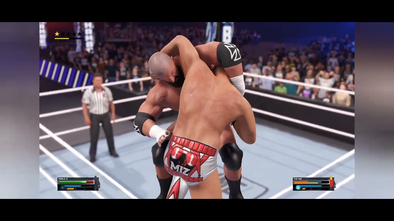 WWE 2K25 Triple H vs The Miz.