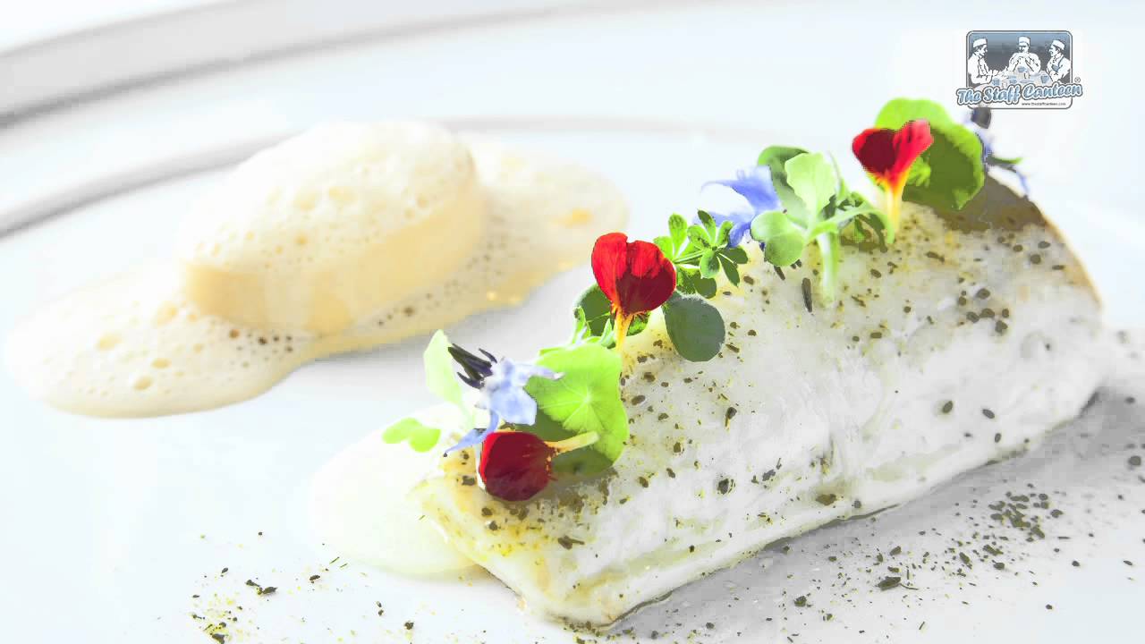 Michelin star chef Simon Hulstone prepares a sole and lobster dish