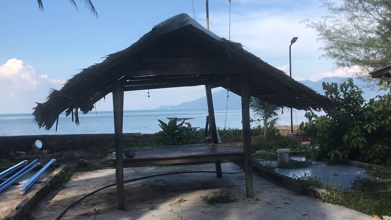 Malaysian fisherman's hut - tropical coconut leaf roof