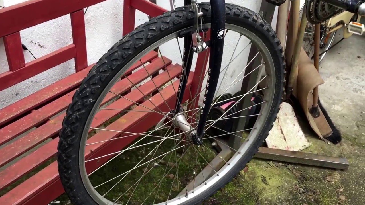 Vorderrad ausbauen MTB Laufrad montieren und demontieren mit Schnellspanner Anleitung