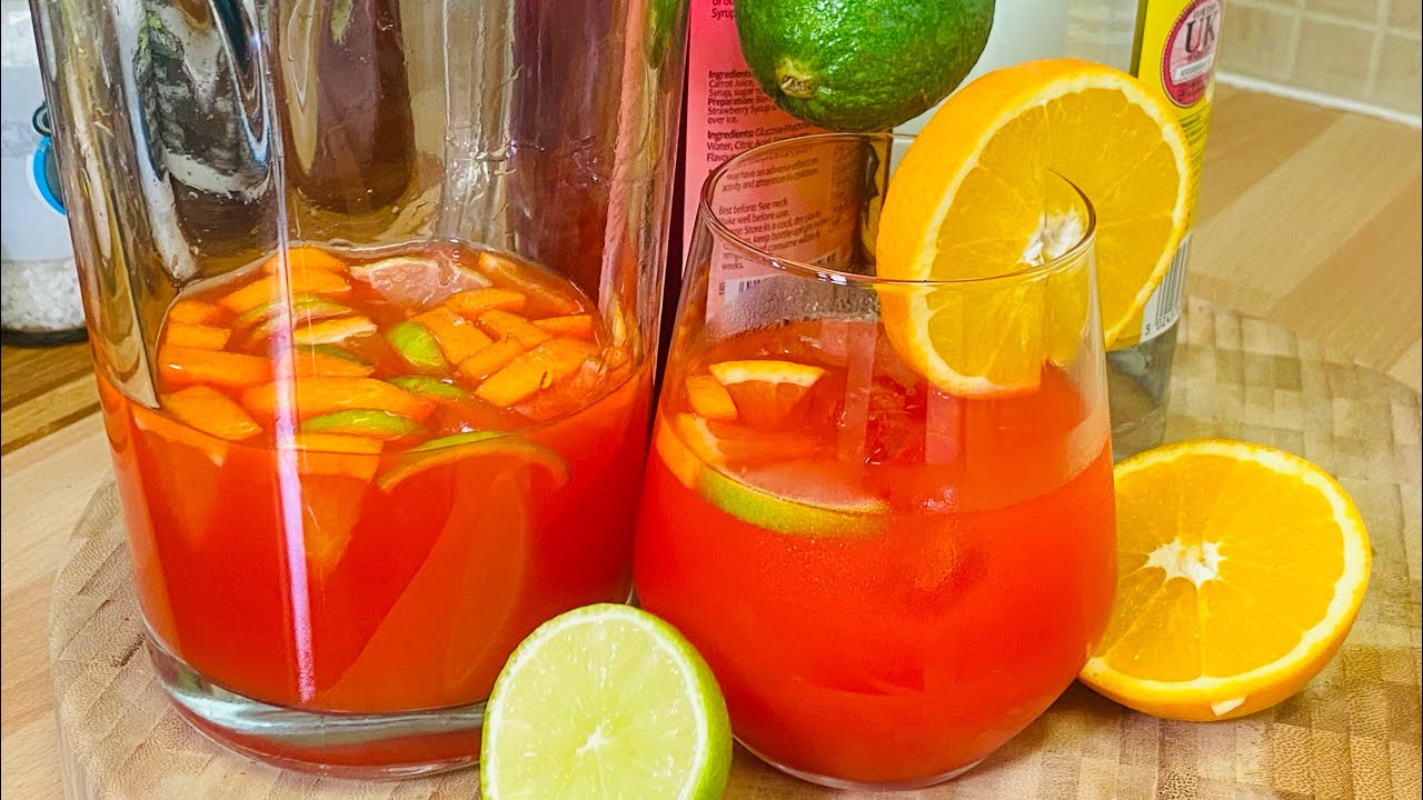 How To Make Jamaican Christmas! RUM PUNCH One OF The Best IN THE WORLD!