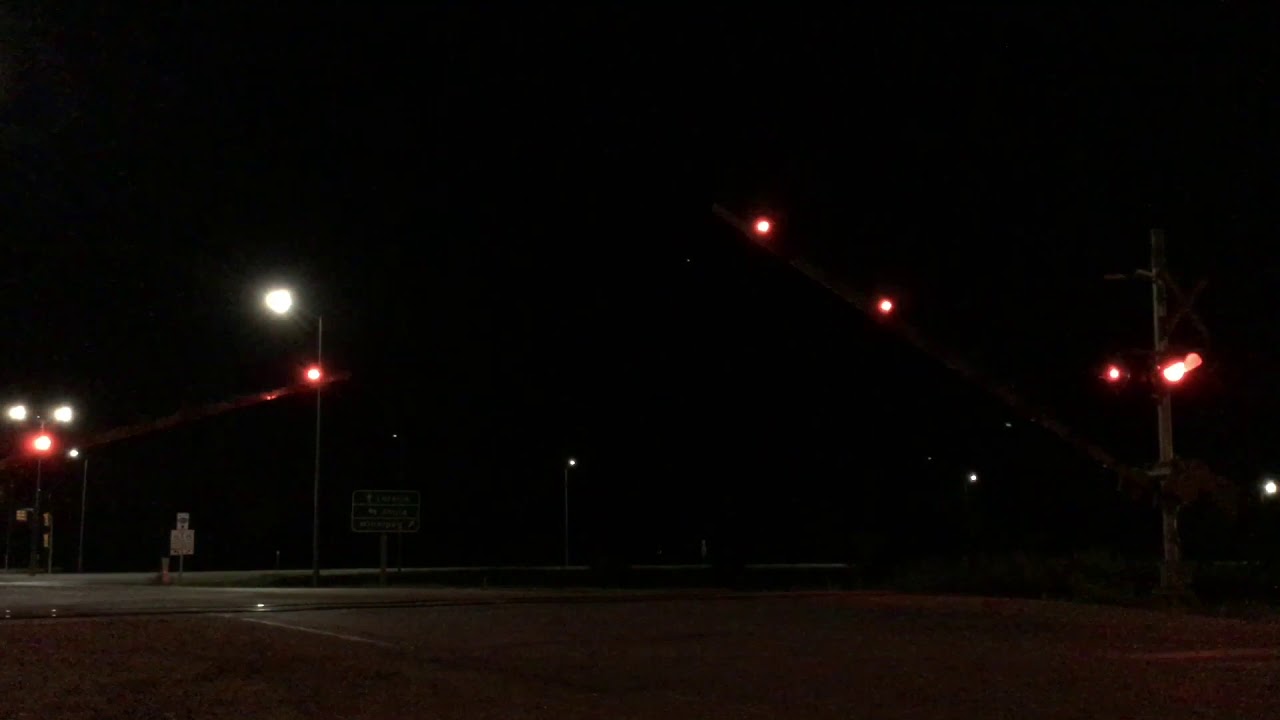 A CN ET44AC Pulling a Fast Intermodal Heading Eastbound Leaving Winnipeg. (08/20/2019)