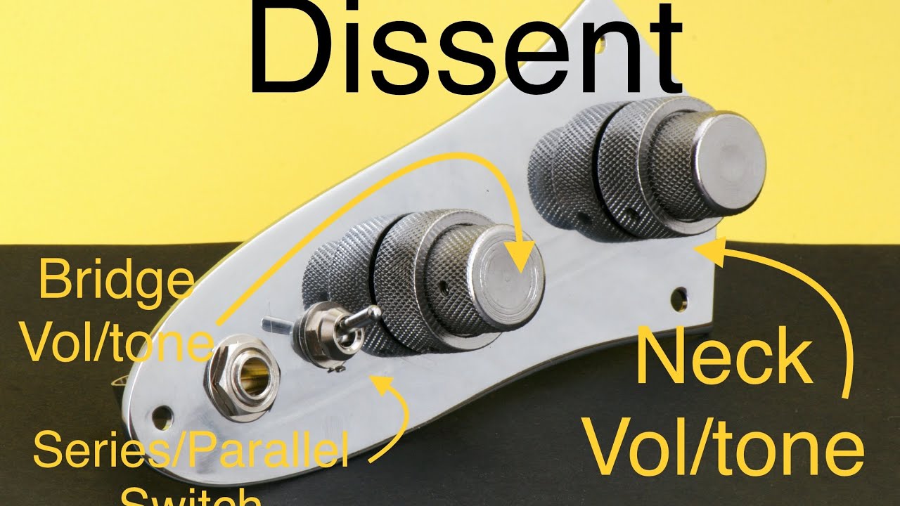 Soldering a 60s Jazz Bass circuit with a series parallel switch on a black plate.