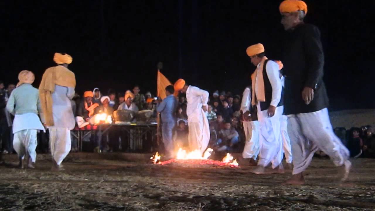 Fire Dance at Bikaner Camel Festival 2014 in Rajasthan, India. January 2014
