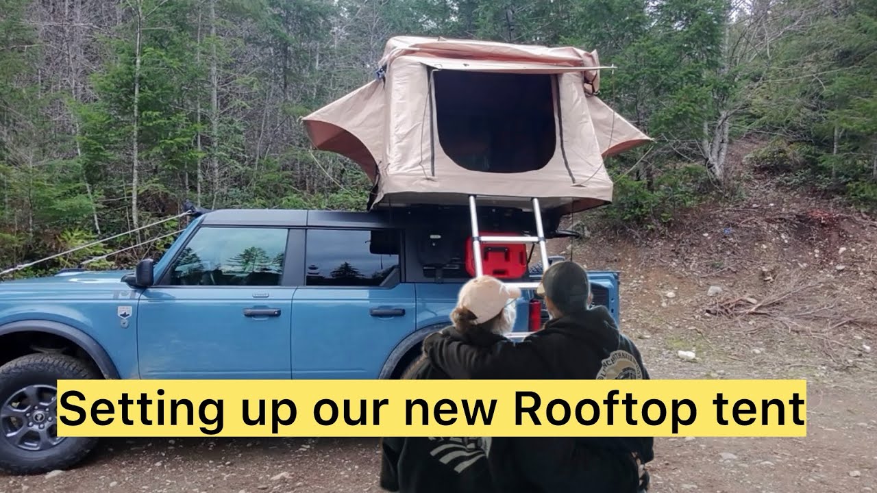 Setting up our new RTT down at the lake on Vancouver island 