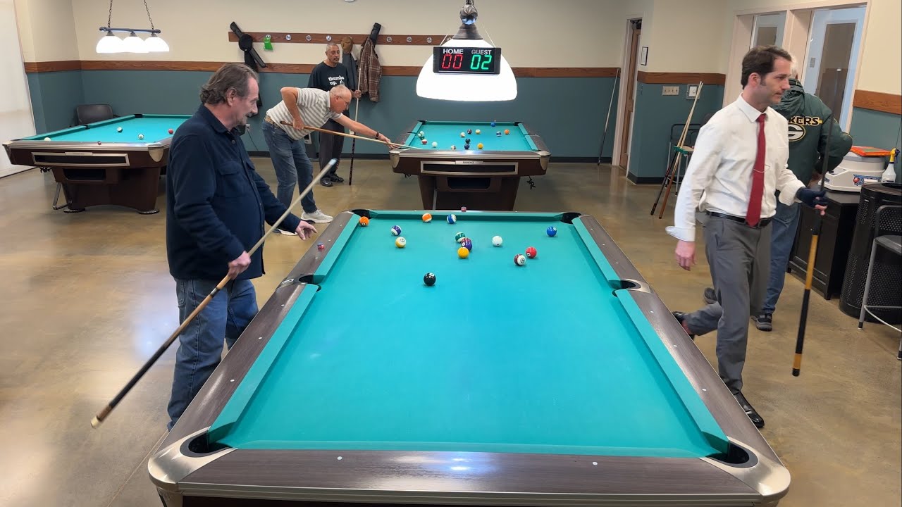 The OSG putting up a Dawg Fight in One Pocket on 9ft Brunswick at The Senior Center