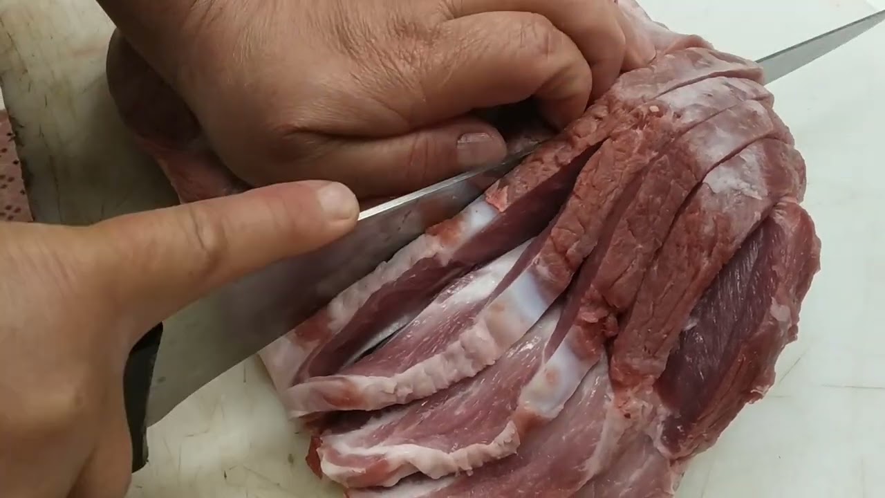 chuletas de aguja de cerdo ,  como partir para que no se nos desvíen