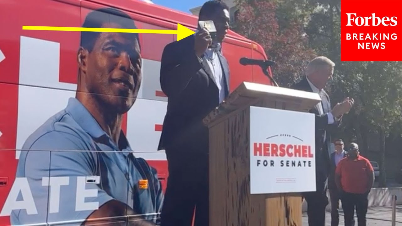 JUST IN: Herschel Walker Brandishes Controversial Badge After Viral Debate Moment In Campaign Speech