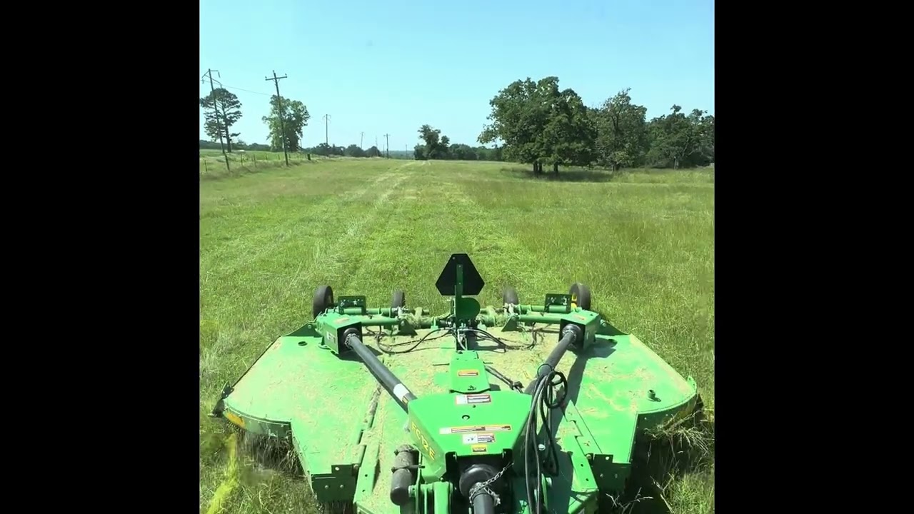 Mowing pastures with new John Deere FC12E flex wing mower