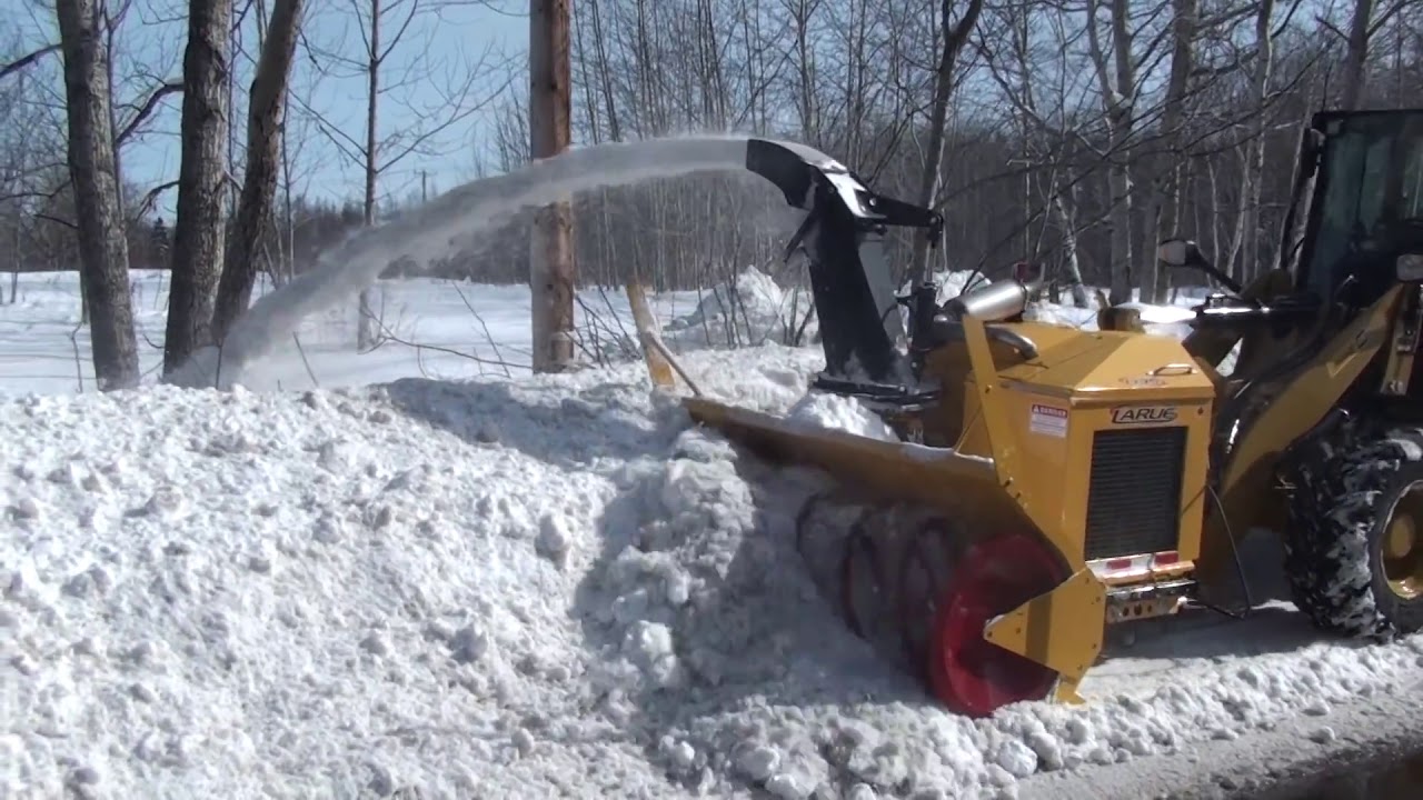 Larue D25 loader-mounted snow blower in action