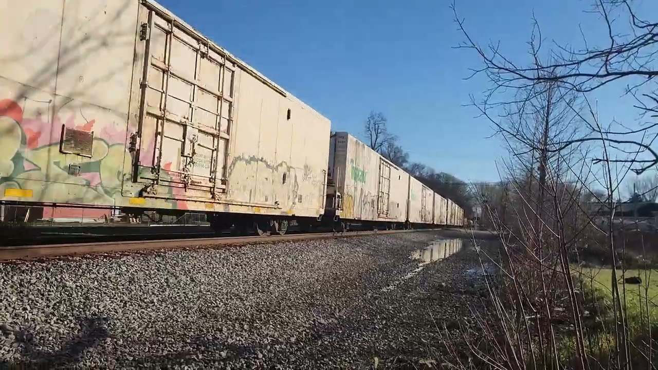 YN3c CSXT 940 leads I03116 through Aberdeen