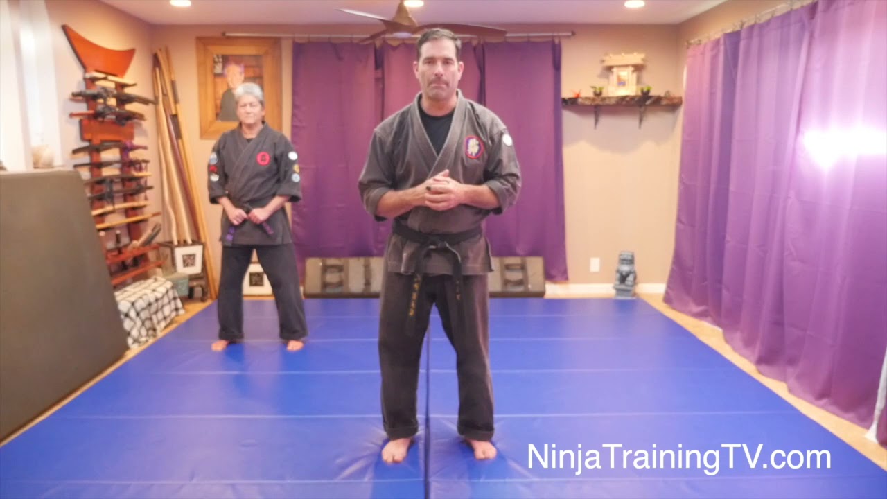 Behind the back, double-handed grab escape