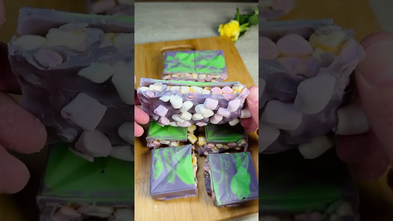 Part 2 🍫Taking this gooey marshmallow & toffee chocolate out of the mold &ndash; wait for that snap🤤💜💚