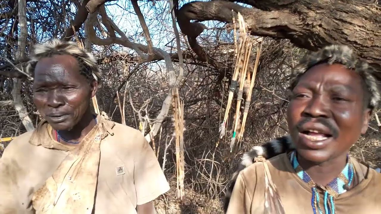 Hadzabe tribe men speaking their beautiful language.