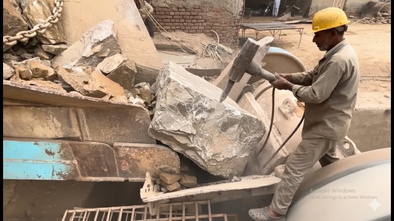 Giant Jaw Crusher JAMMED - Worker Saves the Day!
