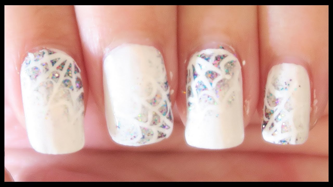 Sparkling Spiderwebs Halloween nail art