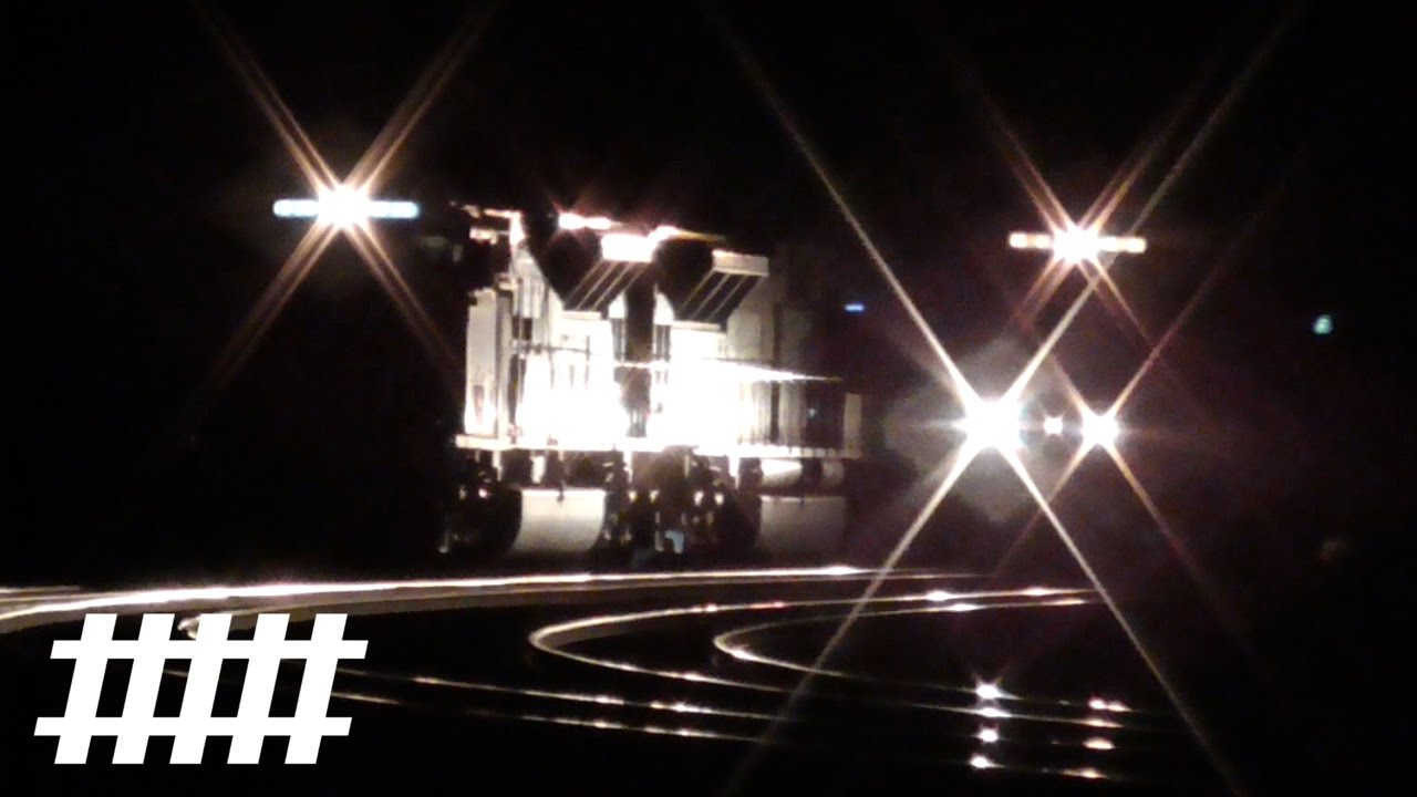PRR Signal Bridge PT 227 at Railroad Crossing in Fostoria, PA at Night With NS Trains