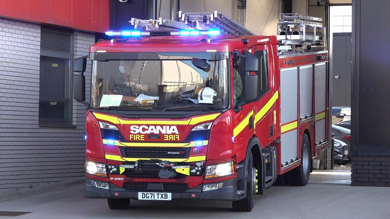 New Fire Engine turning out and responding to an emergency alongside an older truck (Merseyside)