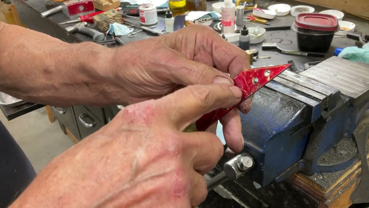2741.  Creating a replacement Artophone door hinge is all hand work