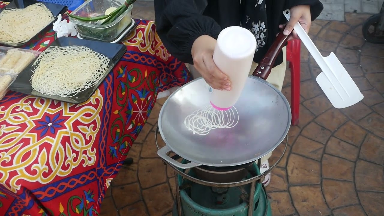 Thai Net Crepe. Similar to Malaysian Roti Jala. Yumm!!
