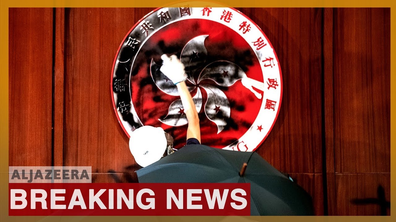 Hong Kong protesters storm legislature, smash doors and walls