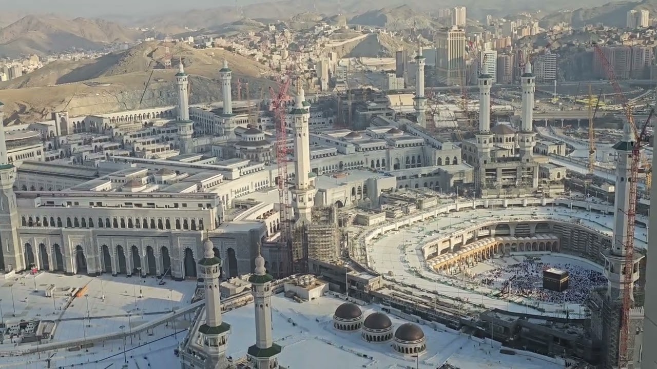 Awe-Inspiring View of the Kaaba from the Clock Tower: A Journey of Faith and Serenity.