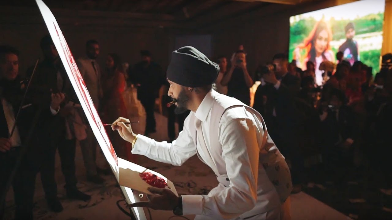 Groom Surprises Bride At Wedding With Live Painting Of Her Upside Down!