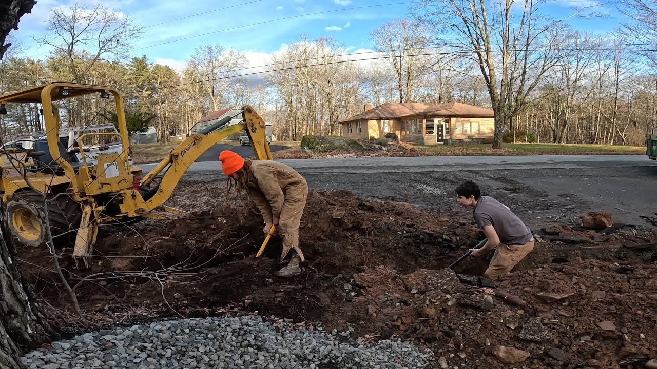 Digging a trench and laying pipe