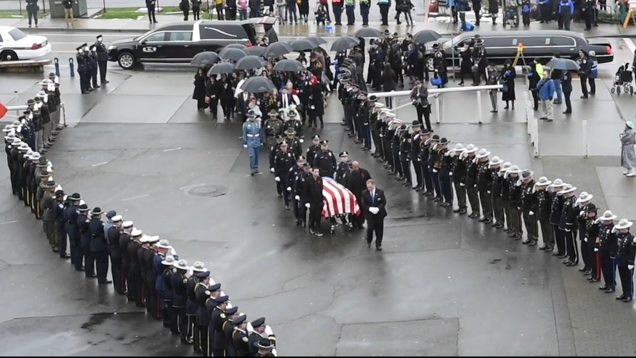 Procession And Memorial Service Honoring Fallen Officer