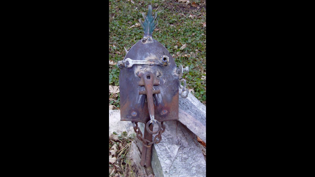 Yard Art Face made from Scrap spade Shovel head