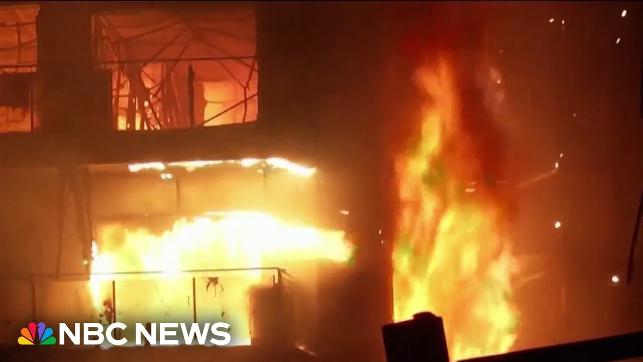 Spain apartment complex fire kills at least 10