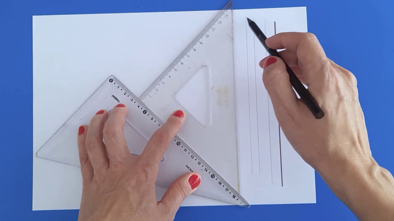 Como construir retas paralelas usando o par de esquadros.